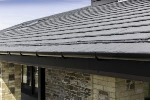 Bryn Bach Park Visitor Centre with Charcoal Metrotile Lightweight Roofing Slate .900 extra secure solution